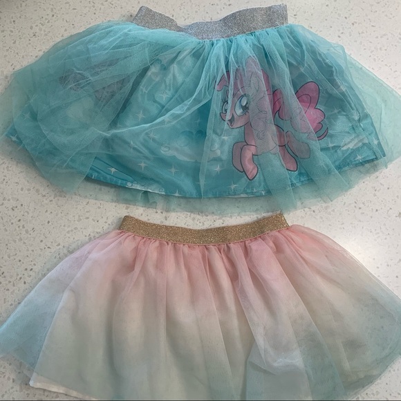 Other - 5/$20 Two glitter band ruffle skirts